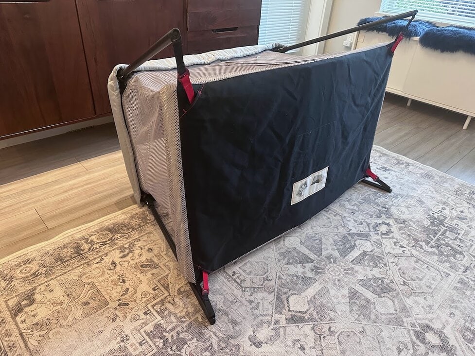 Collapse baby online bjorn travel crib